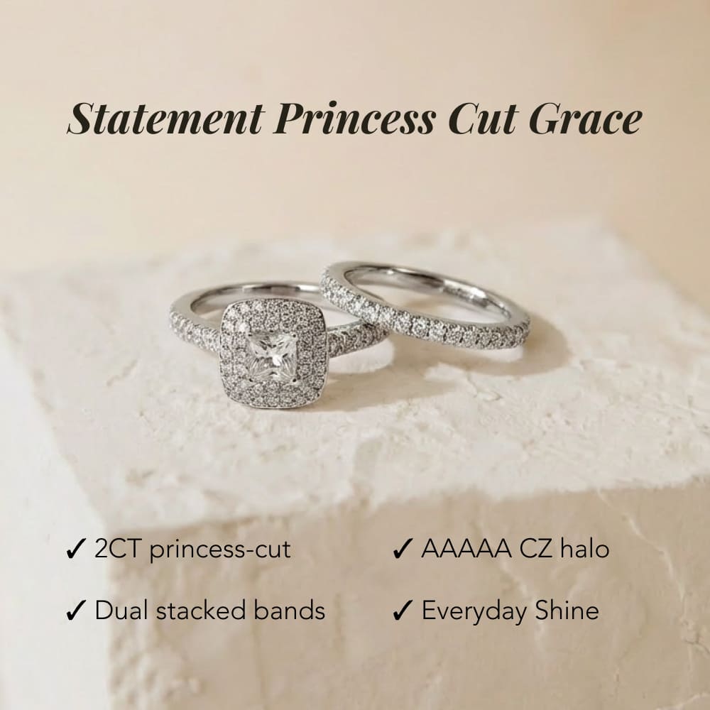 Two silver rings with princess-cut gemstones on a beige background