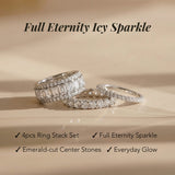 4-piece ring stack set with emerald-cut center stones on a beige background